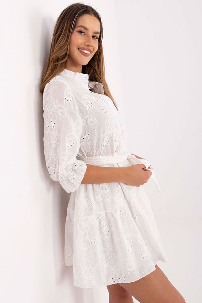 White cotton embroidered flare mini dress with long puff sleeves and gathered skirt