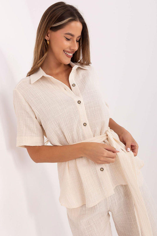 Beige linen-blend shirt and shorts set with button front and tied waist