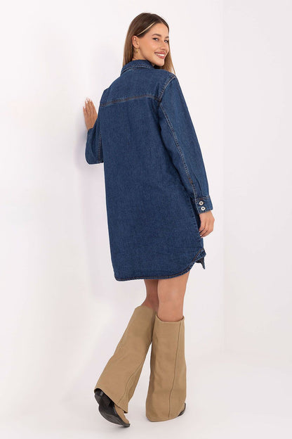 Blue denim long-sleeve shirt dress with button details, side view