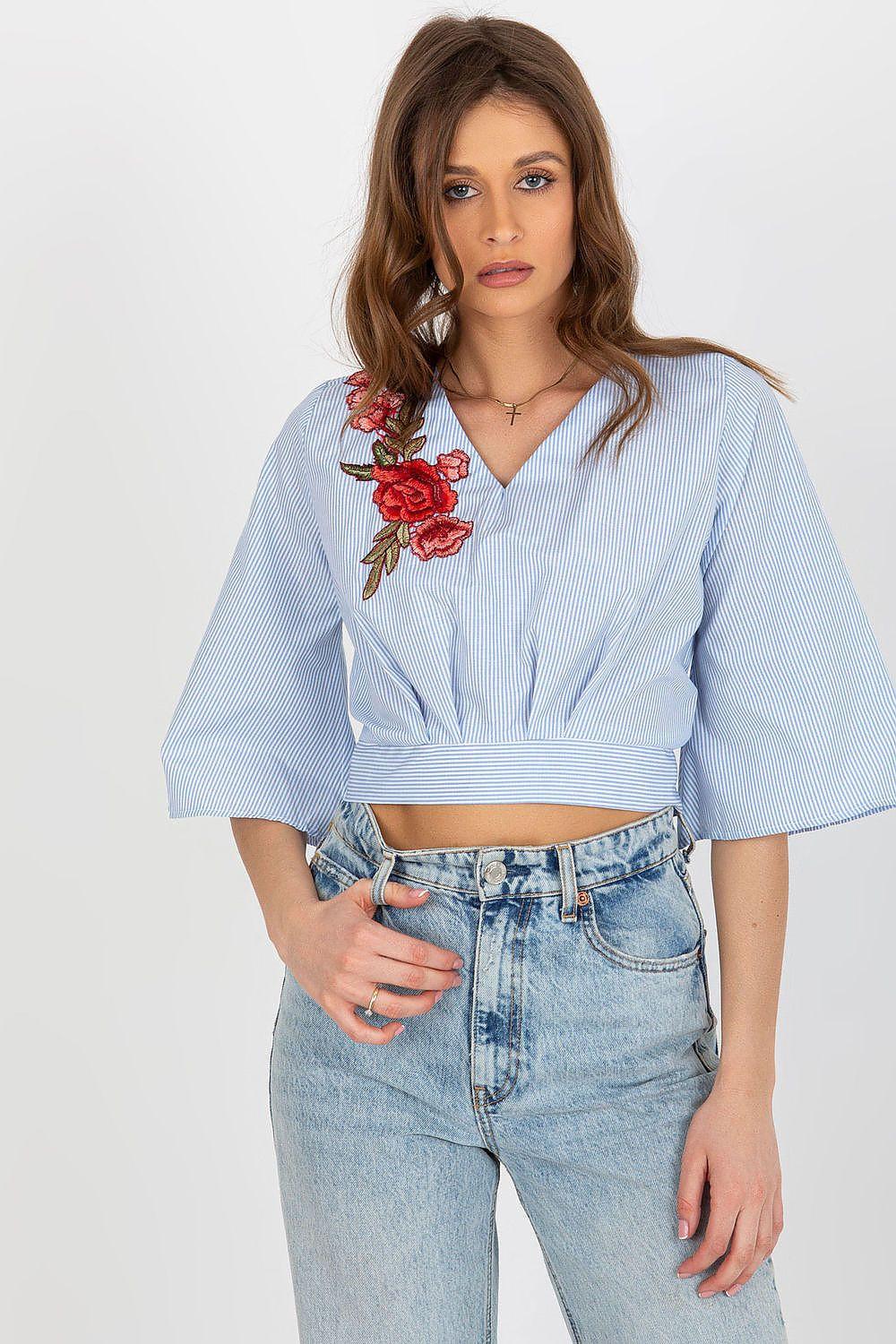 Light blue striped cotton blouse with V-neck and red floral embroidery, tie-back waist