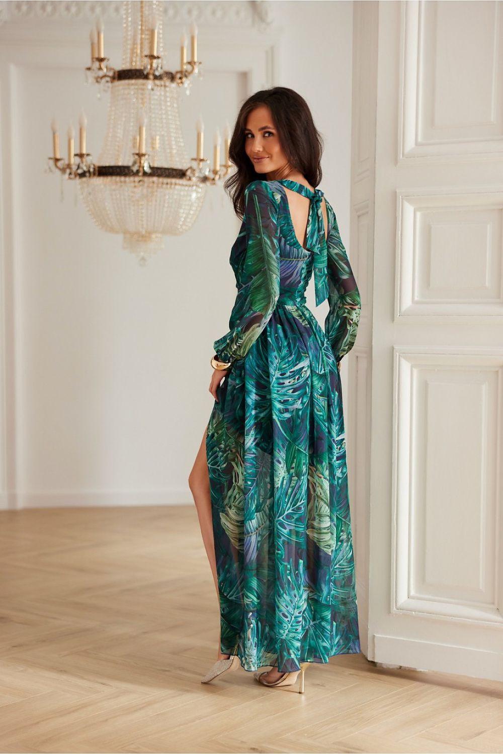 Long sleeve cocktail dress with teal-green leaf print, V-neck and side slit
