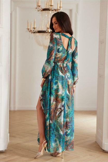 Cocktail dress in teal and multicolor print, open back with tie strap, long sleeves