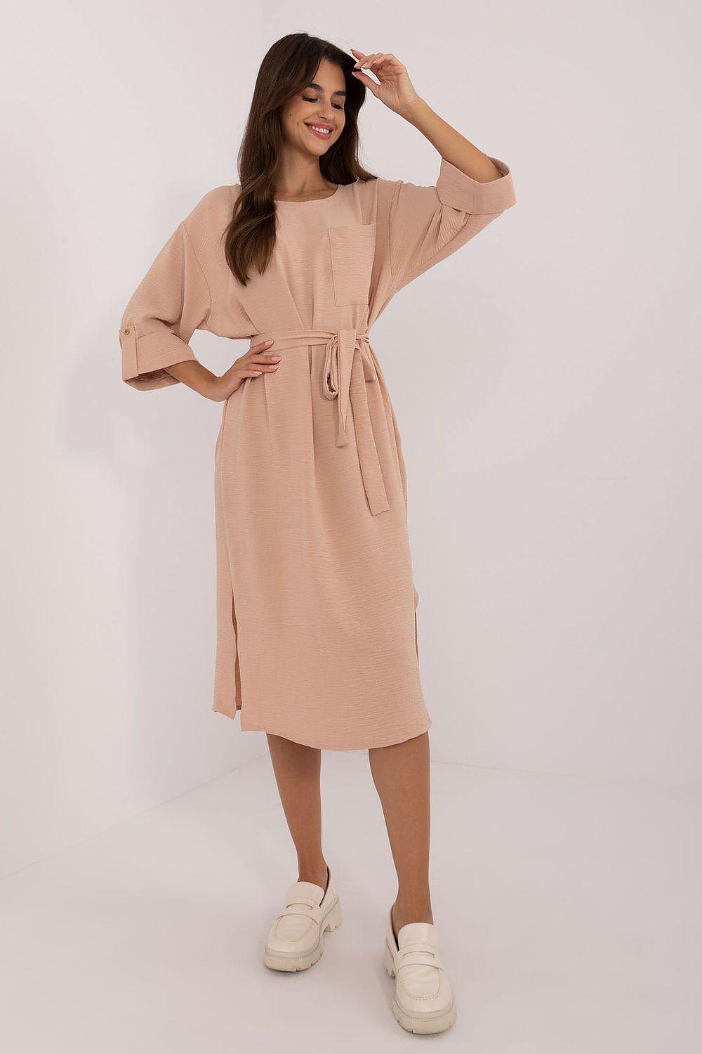 Beige midi daydress with V-neckline, tie waist belt, and three-quarter sleeves