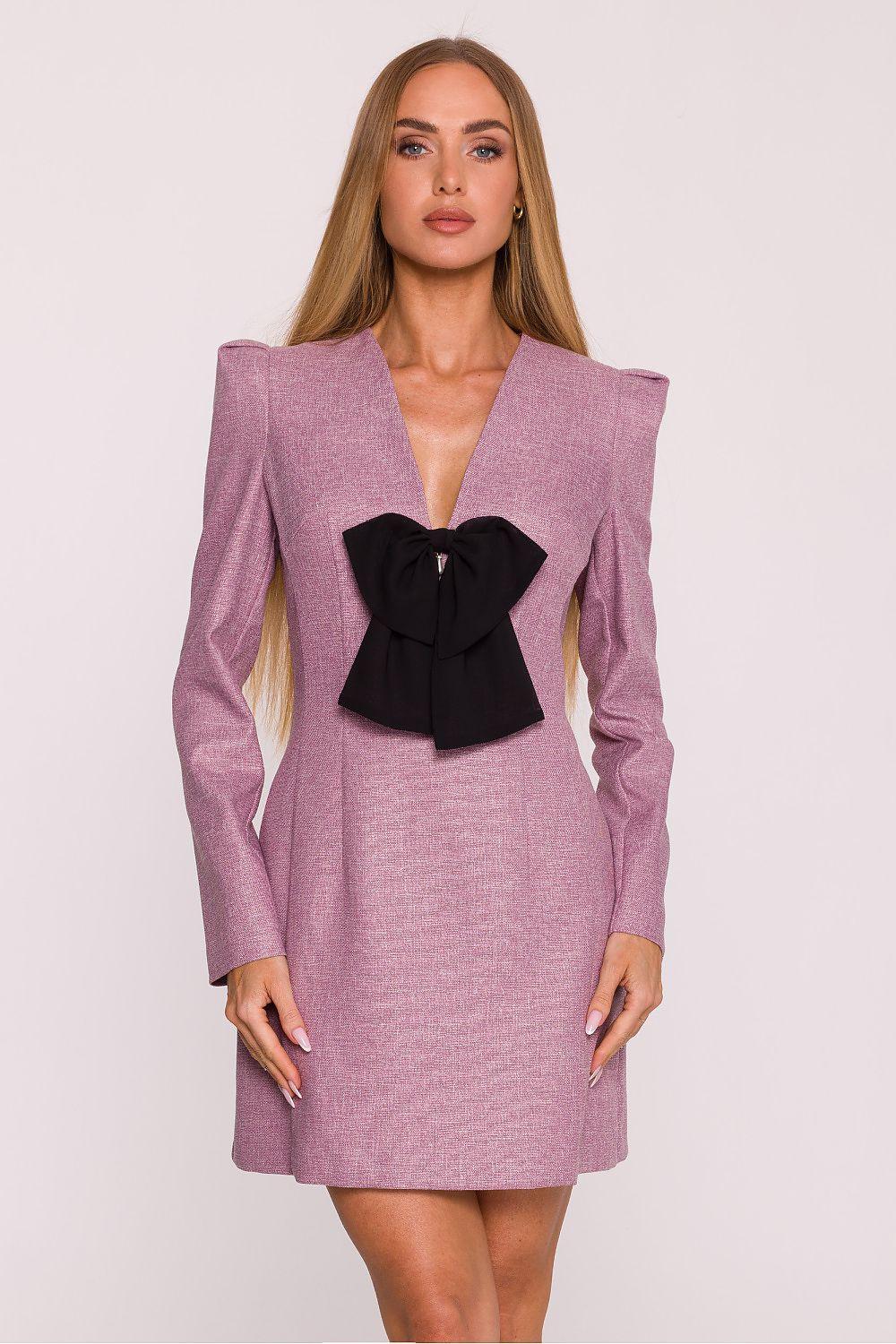 Mauve daydress with black bow at V-neck, long sleeves and fitted waist.
