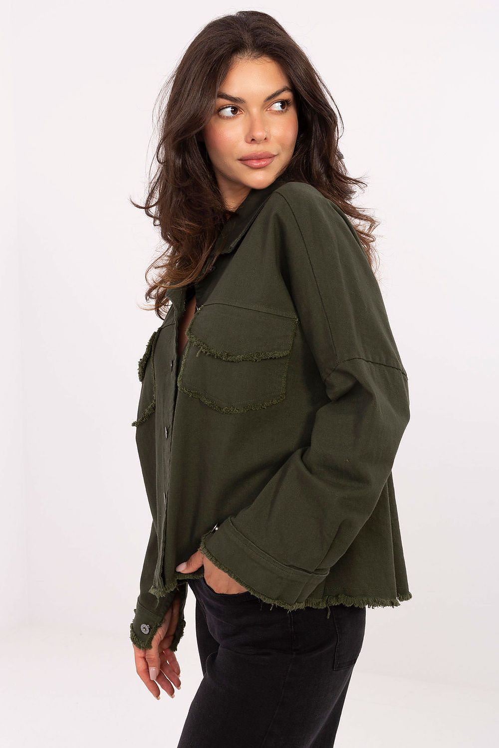 Dark green long sleeve shirt, button front, chest pockets, side view