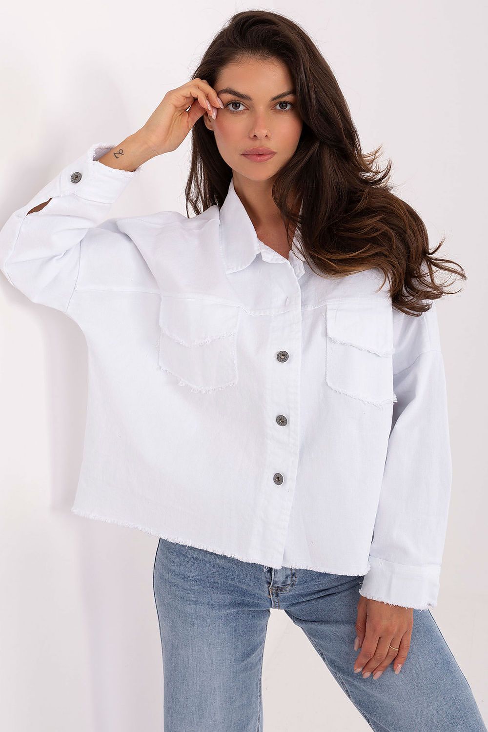 White long sleeve shirt with button front and chest pockets