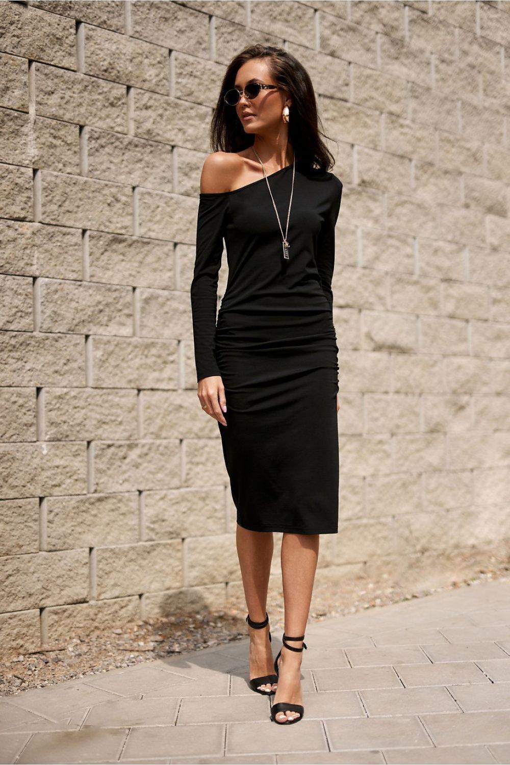 Black one-shoulder midi evening dress with draped neckline and long sleeves.