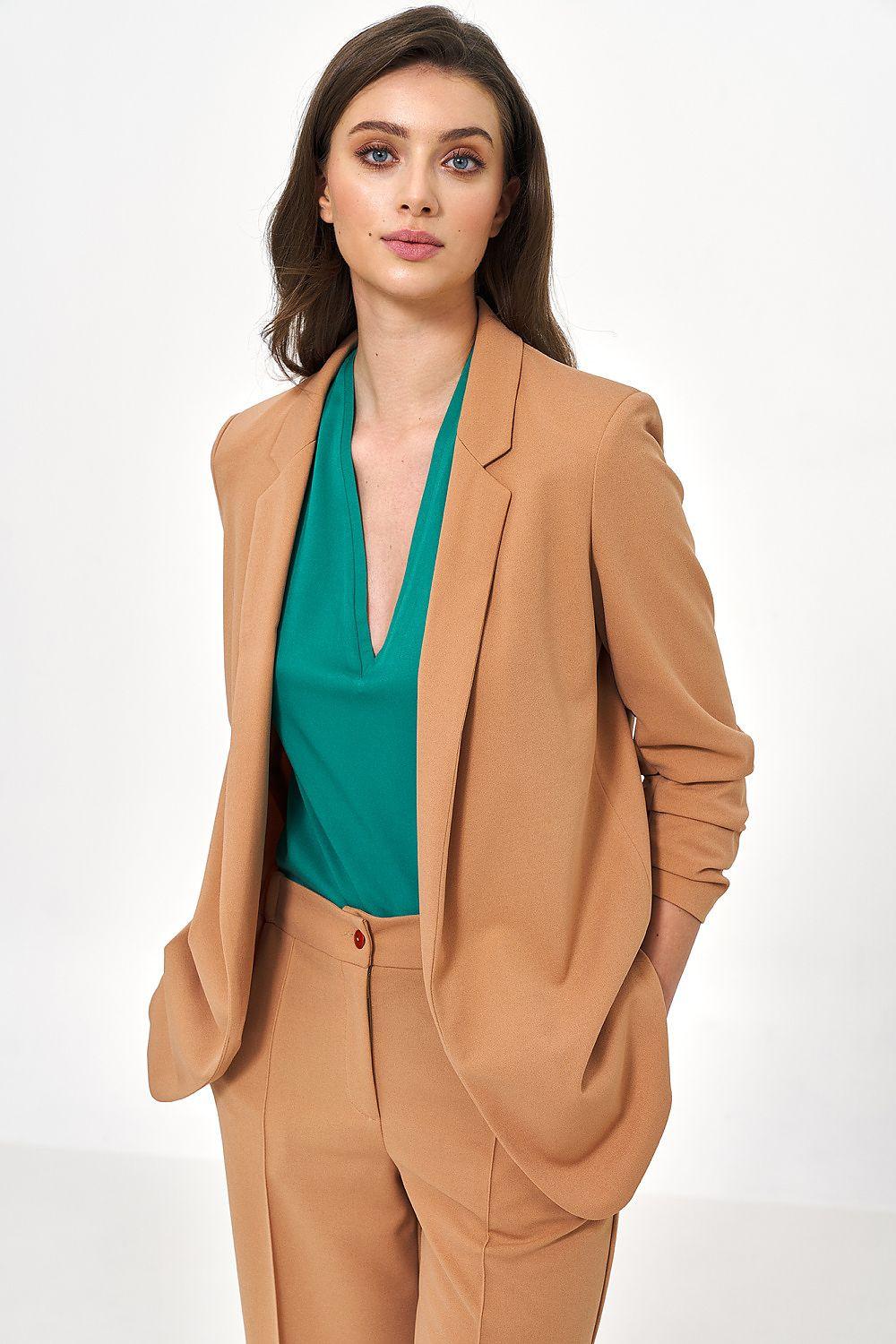 Women's blazer jacket in tan with notched lapels and gathered sleeve cuffs, open front