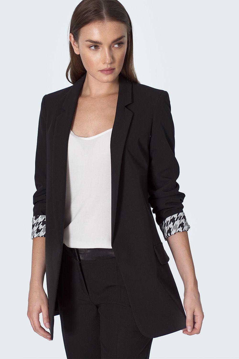 Black women’s blazer with notch lapels and patterned cuffs