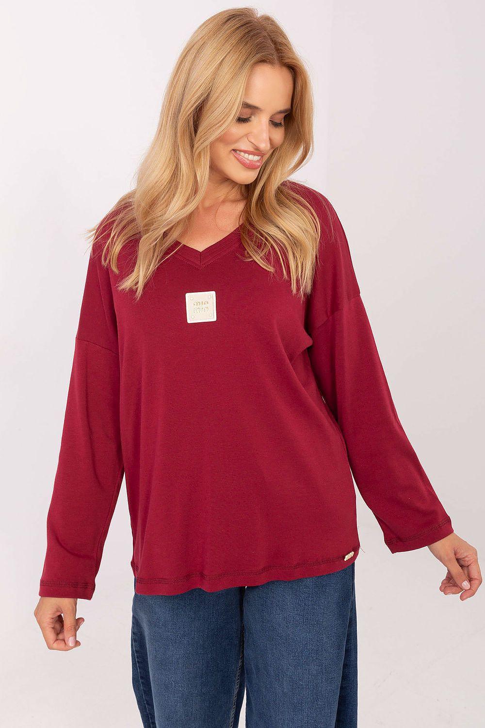 Burgundy long-sleeve blouse with V-neck and relaxed fit
