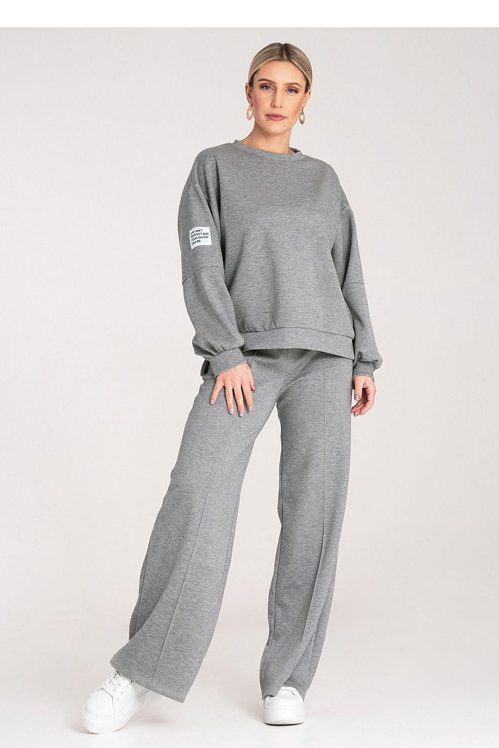 Grey two-piece loungewear set with sweatshirt and wide-leg pants, front view