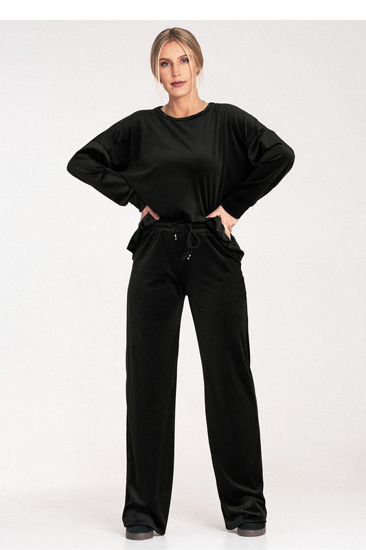 Black lounge set with long-sleeve top and relaxed wide-leg pants, tie waist
