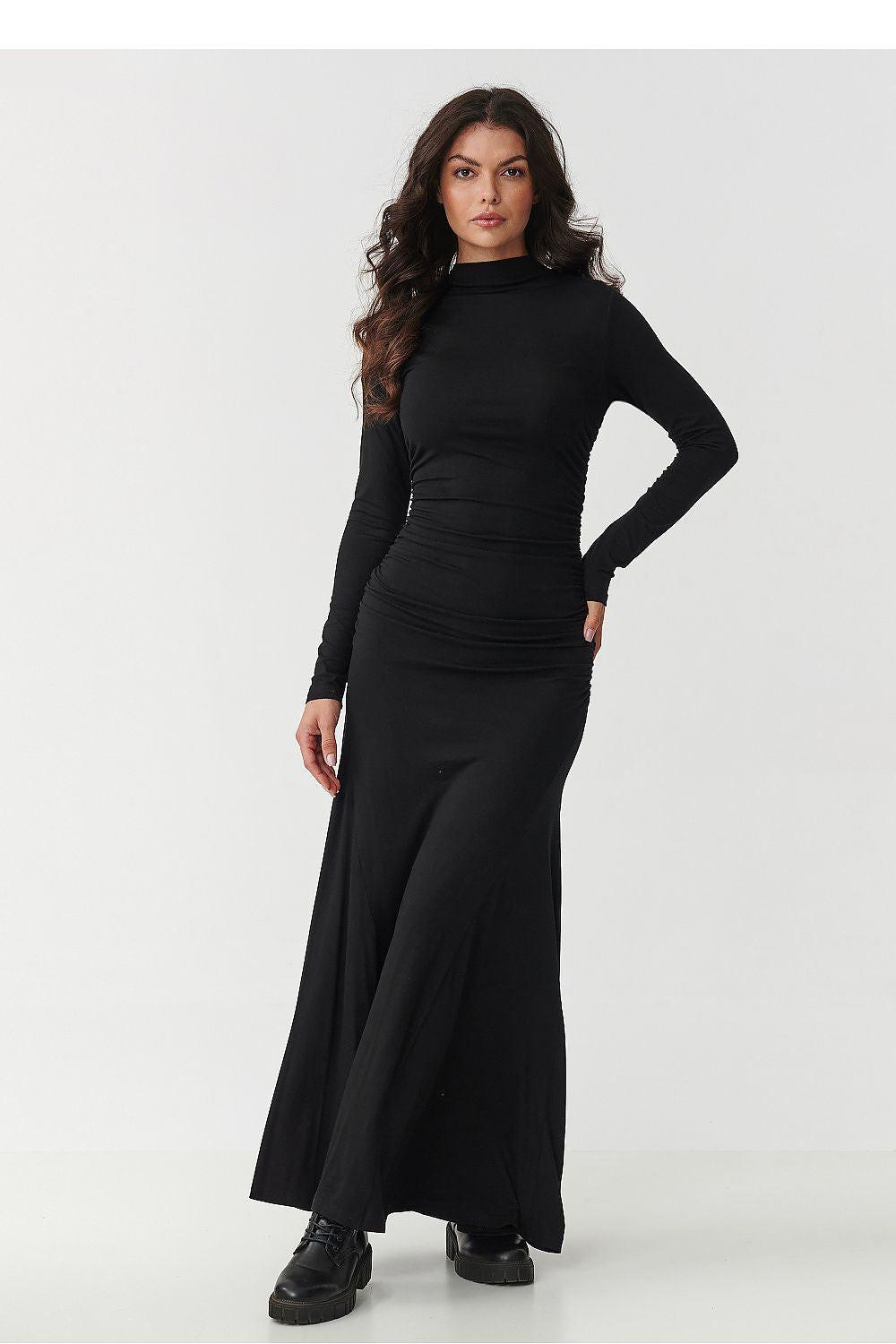 Black long-sleeve daydress with high neck and gathered waist, maxi length