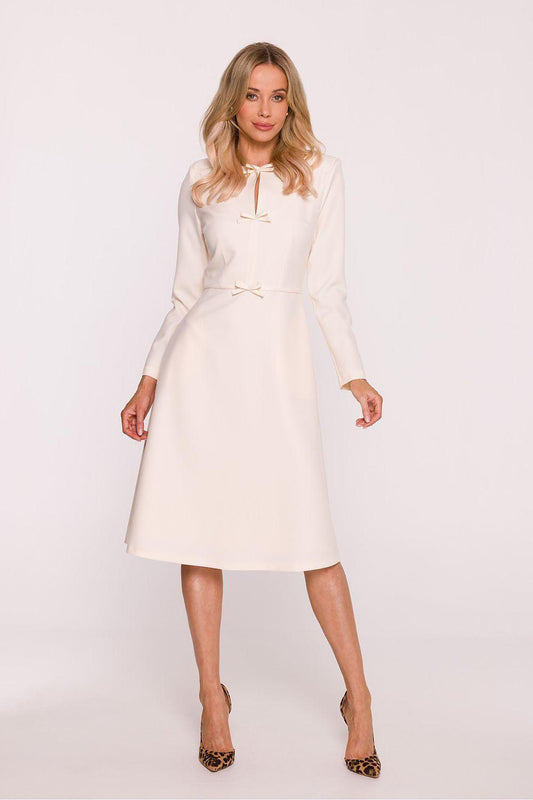 Ivory daydress with long sleeves, tie-front neckline, A-line midi skirt