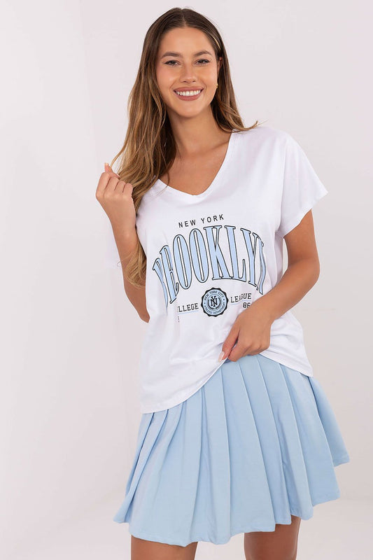 Blue pleated high-waist skirt with white V-neck T-shirt