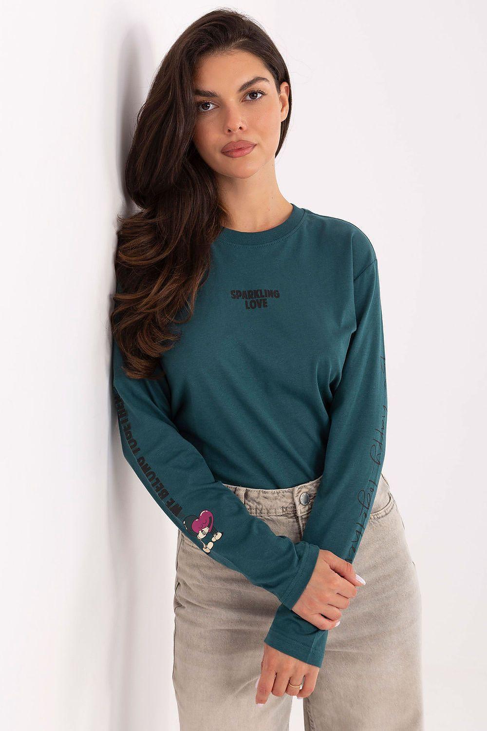 Teal long-sleeve blouse with small chest logo and graphic sleeve text