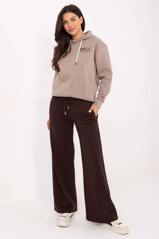 Brown tracksuit trousers, wide-leg cut with drawstring waist and side pockets