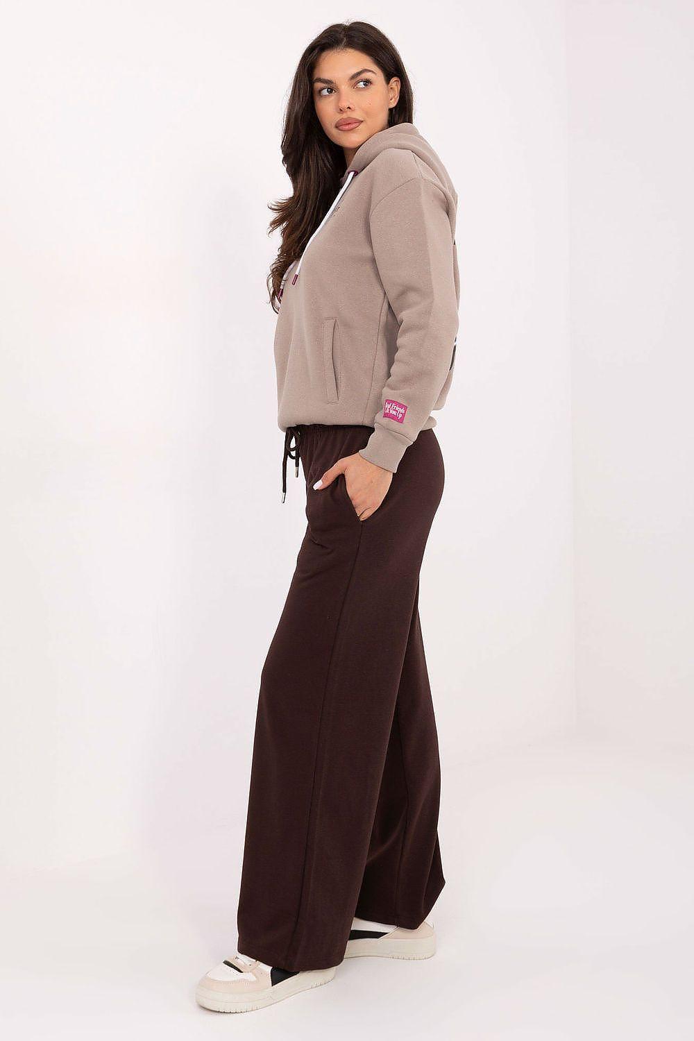 Brown tracksuit trousers with wide straight legs and drawstring waist