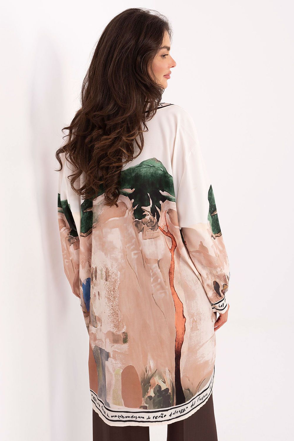 Women’s long sleeve shirt, back view, with abstract painterly print in green and beige