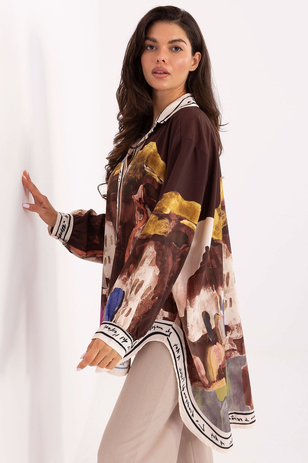 Women’s long sleeve shirt with abstract painterly print and contrast trim at cuffs and hem