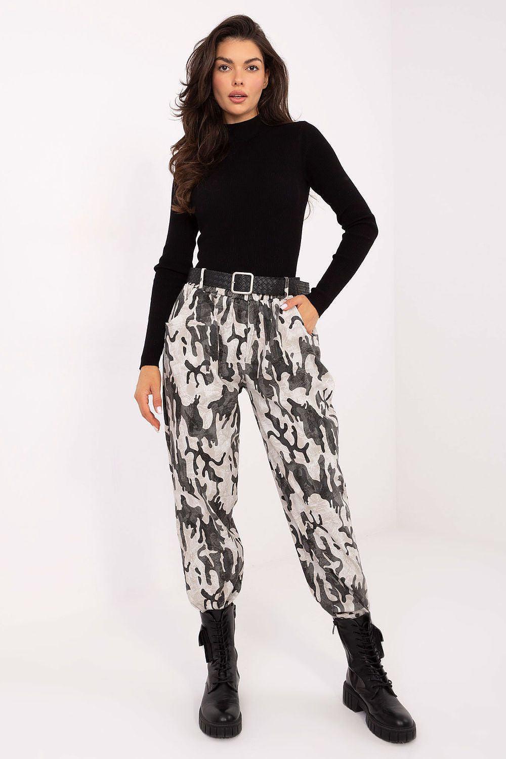 Printed women’s ankle trousers in black and light gray with dark belt detail