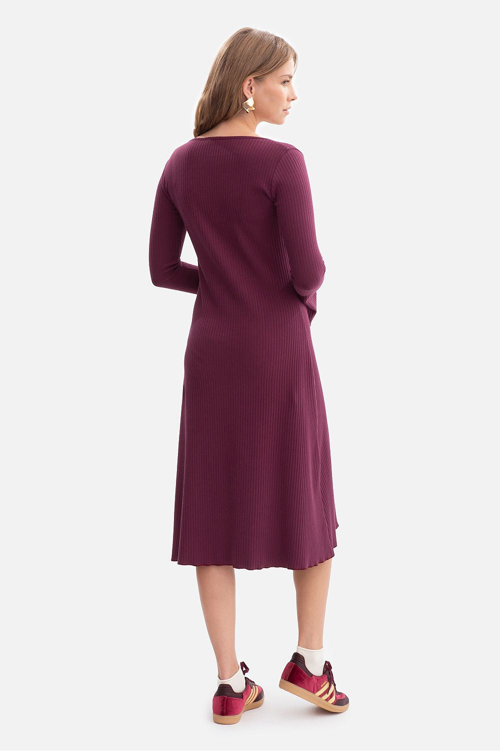 Ribbed daydress long sleeve scoop neck with midi wavy hem, shown from back in dark violet