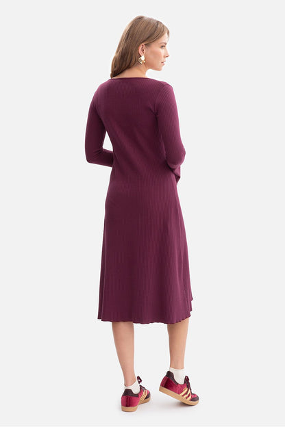 Ribbed daydress long sleeve scoop neck with midi wavy hem, shown from back in dark violet
