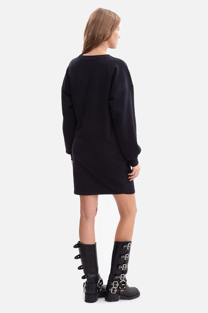 Oversized sweatshirt day dress in black, back view with long sleeves and straight hem