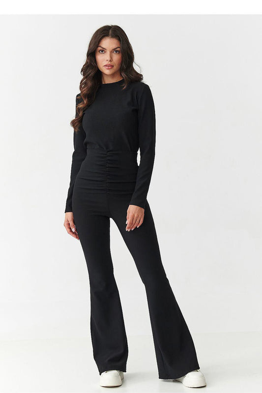Black two-piece set: long-sleeve top and flared trousers with ruched waist