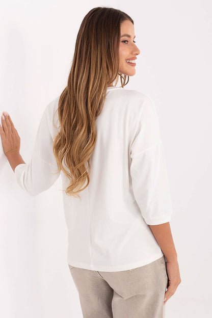 White cotton blouse back view with 3/4 sleeves and crew neckline