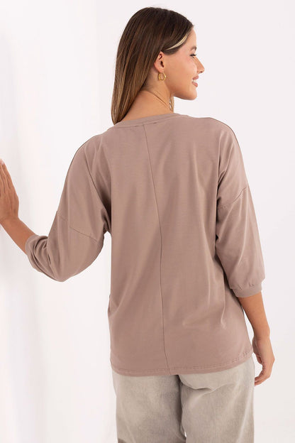 Taupe cotton blouse back view with 3/4 sleeves and crew neckline