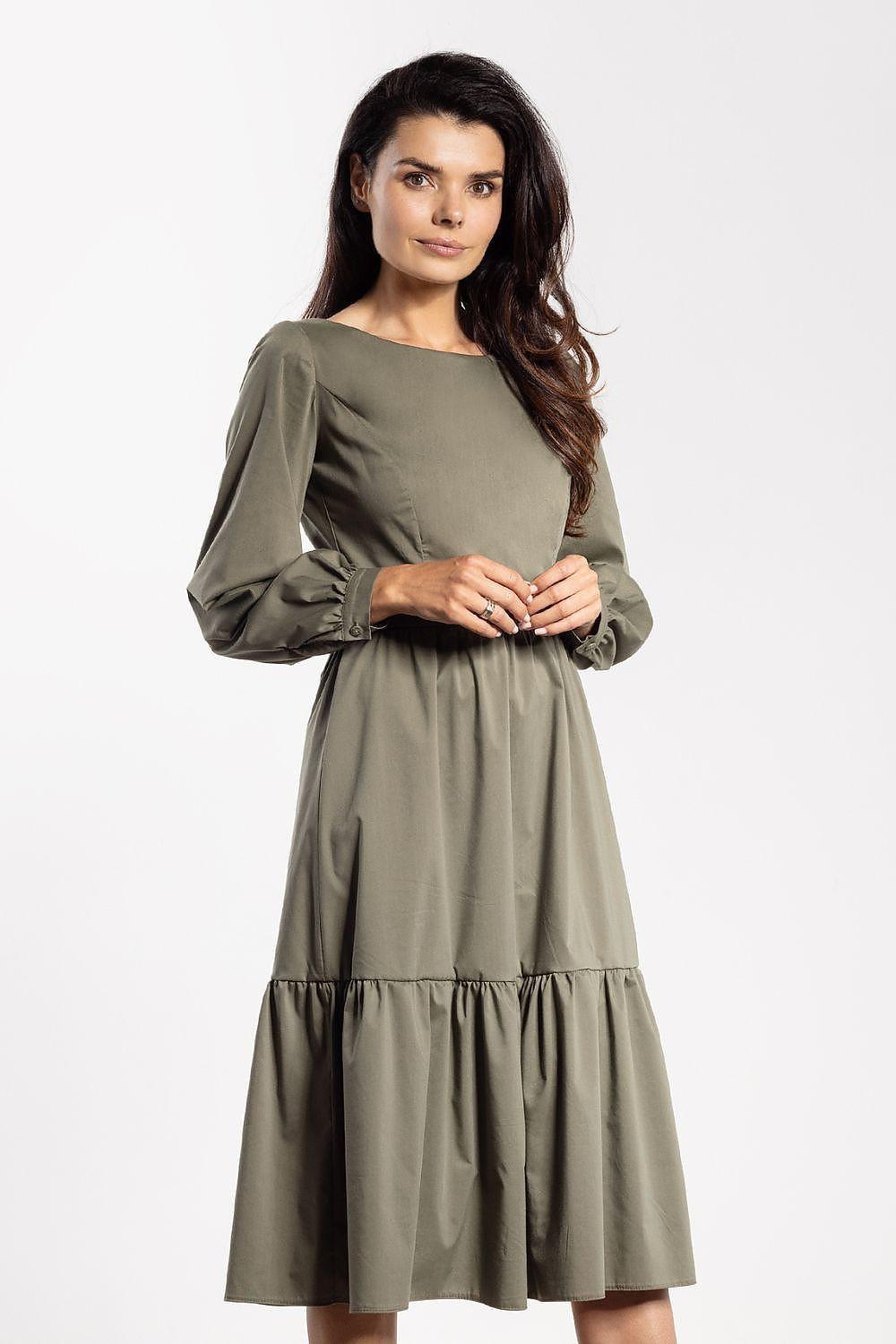Green daydress with long puff sleeves, round neckline, tiered skirt and gathered waist