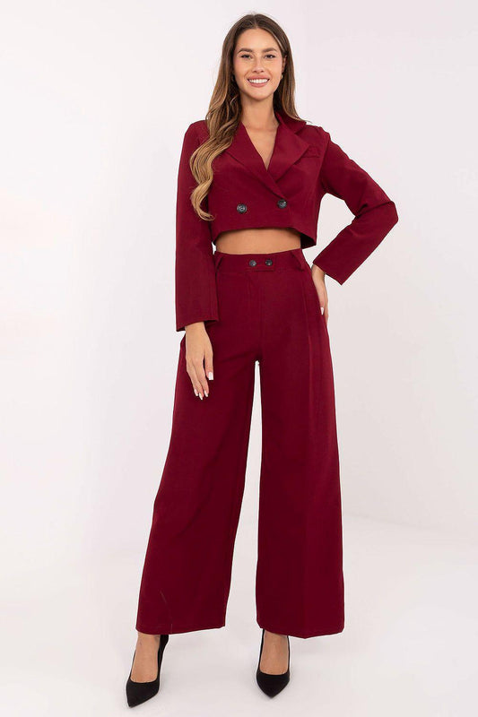 Burgundy two-piece blazer and wide-leg pants set with cropped jacket and button front