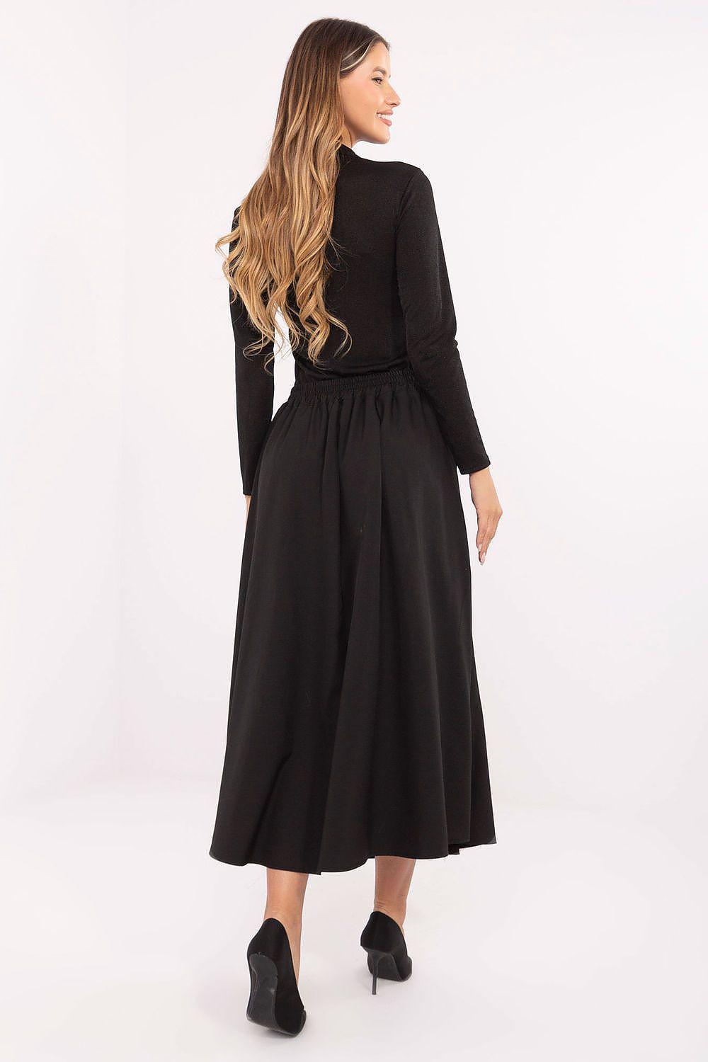 Black midi skirt with pleated flare and gathered waistband at back