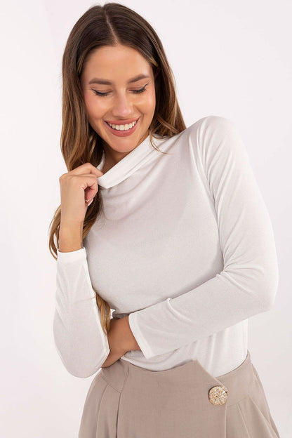 White long-sleeve turtleneck blouse with fitted shape