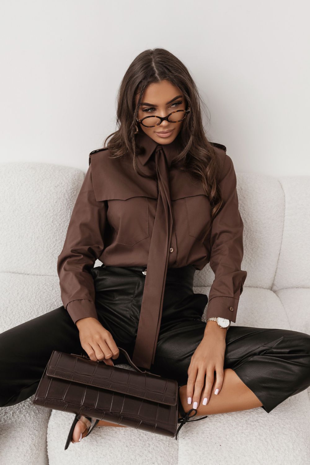 Brown long-sleeve button-up shirt with pointed collar and front buttons