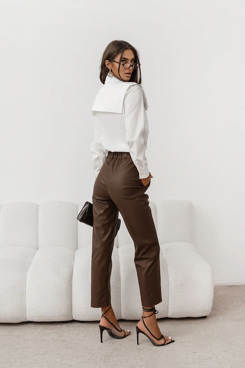 White long-sleeve button-up shirt with pointed collar and button front