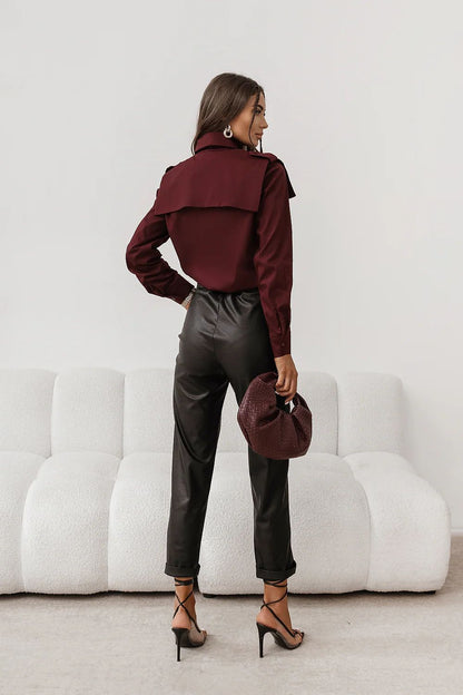 Burgundy long-sleeve button-up shirt with pointed collar and button front (back view)