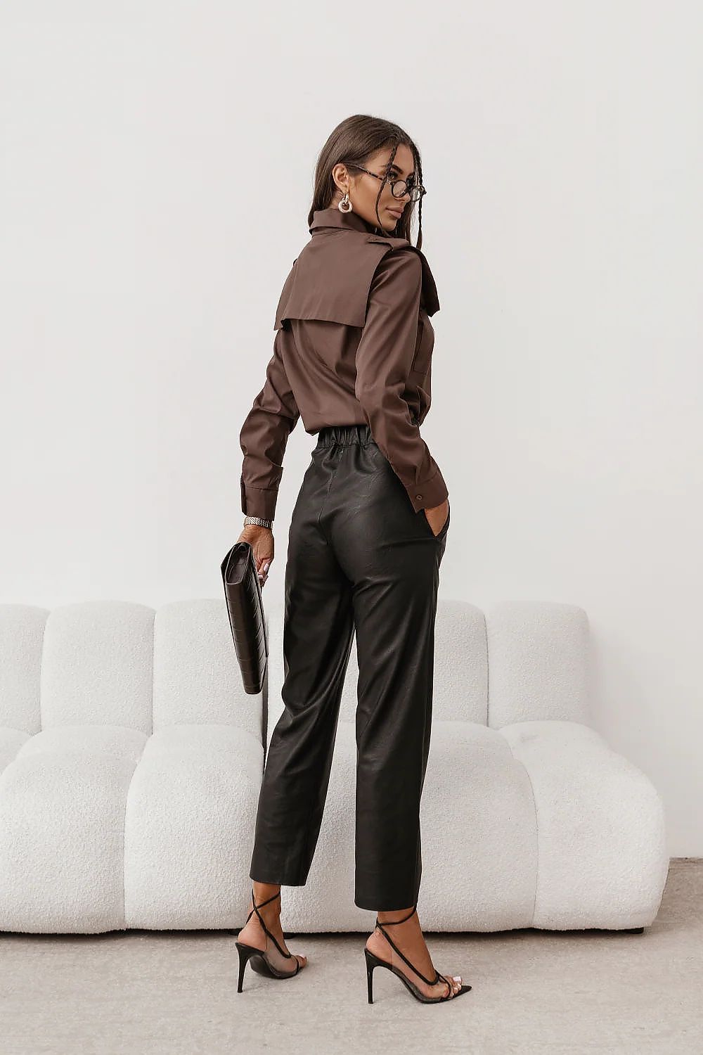 Brown long-sleeve button-up shirt with pointed collar and front buttons (side view)