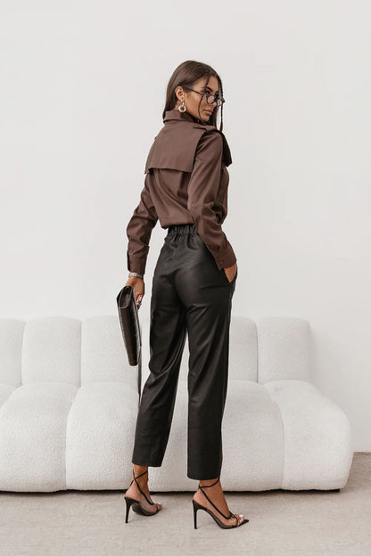Brown long-sleeve button-up shirt with pointed collar and front buttons (side view)