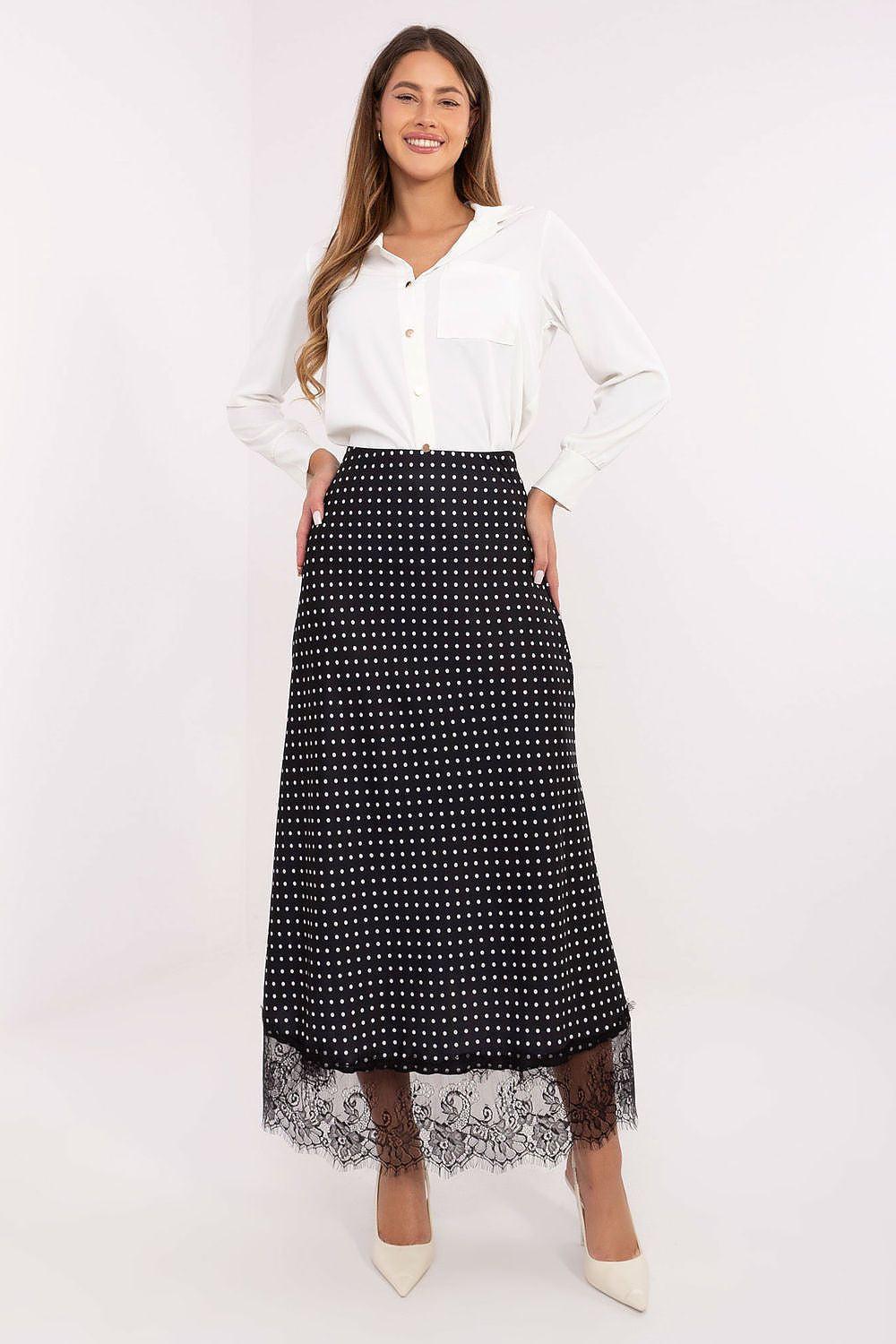 Black long skirt with small white dots and lace-trimmed hem