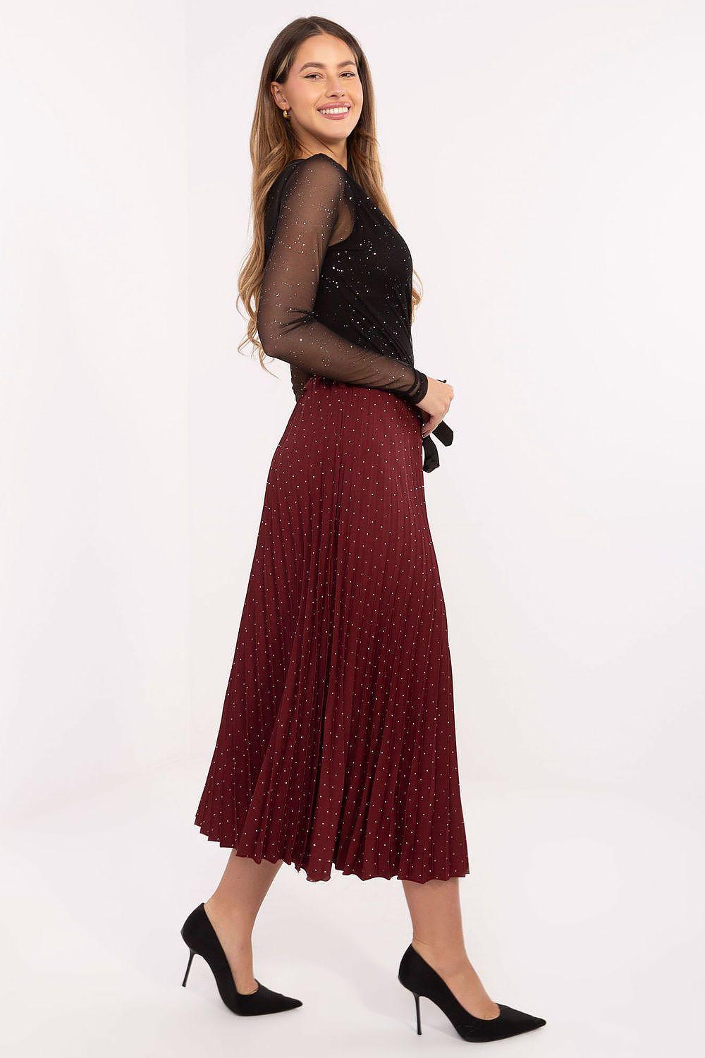 Red pleated midi skirt with micro-dot print and waist tie ribbon