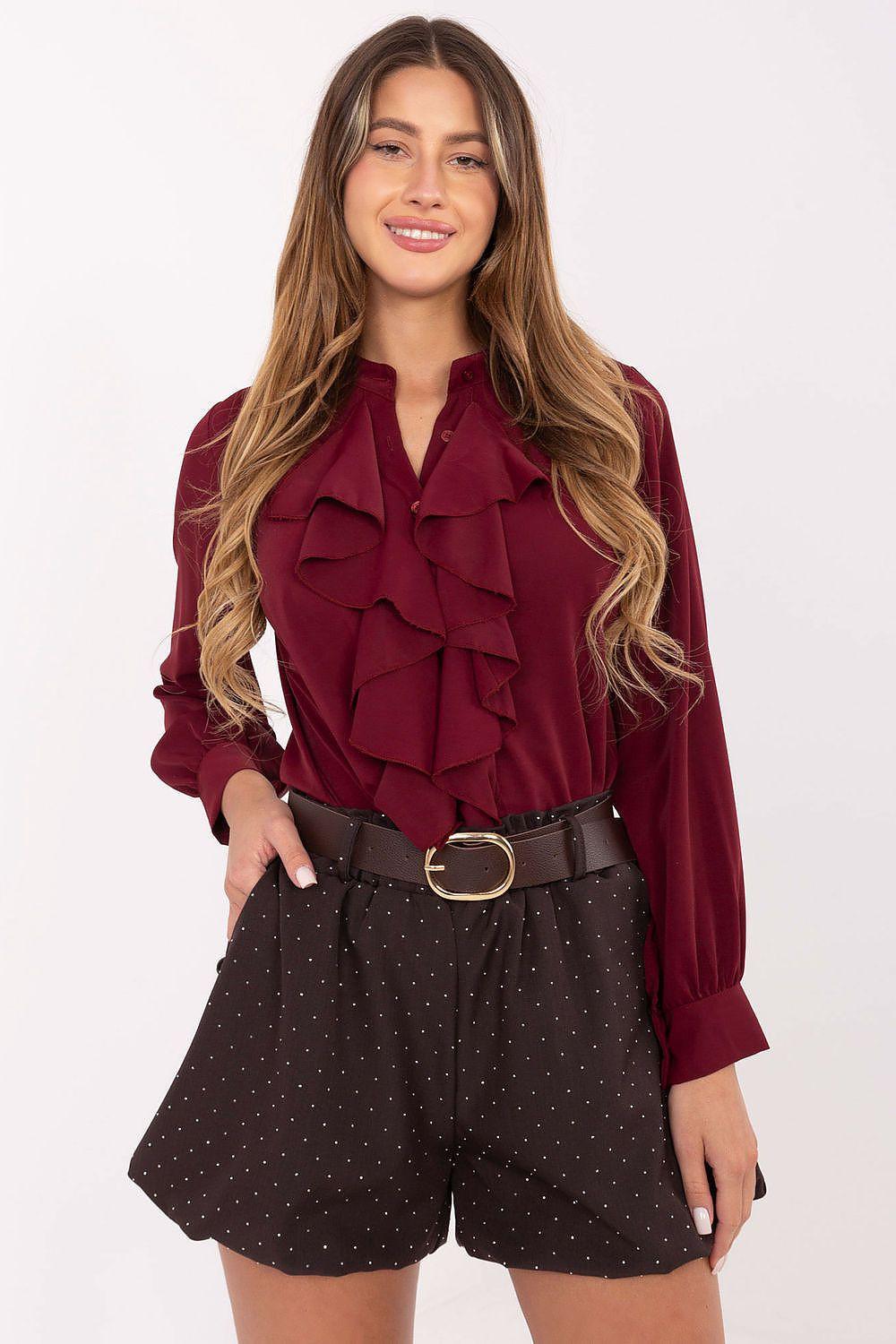 High-waist polka dot shorts with dark brown fabric and gold-buckle belt