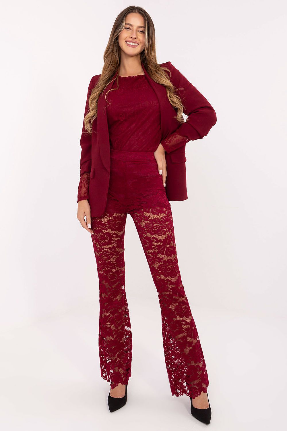 Lace pants in deep red with ornate allover floral pattern, flared straight legs