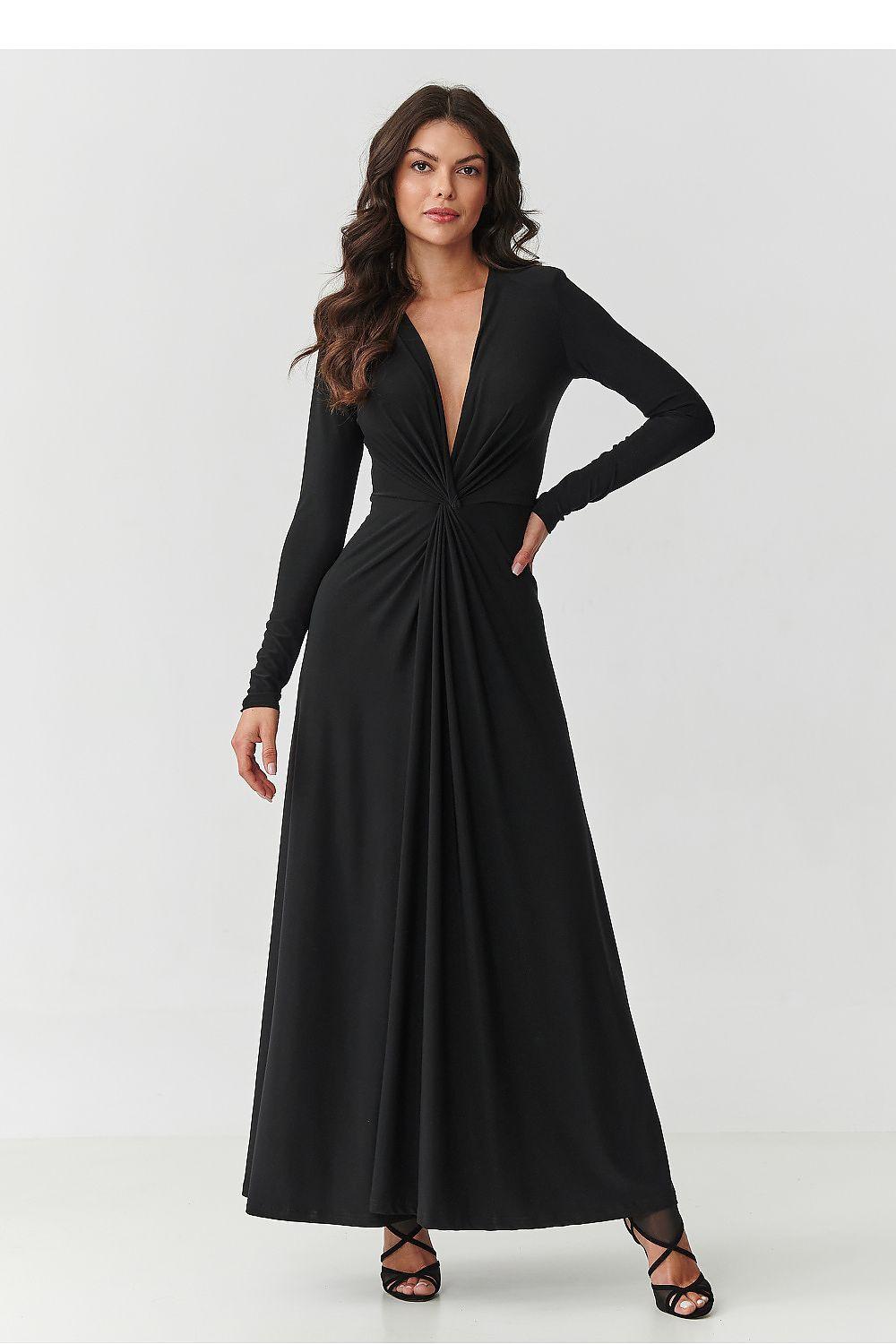 Black maxi dress with deep V-neck, long sleeves, and waist ruching twist front
