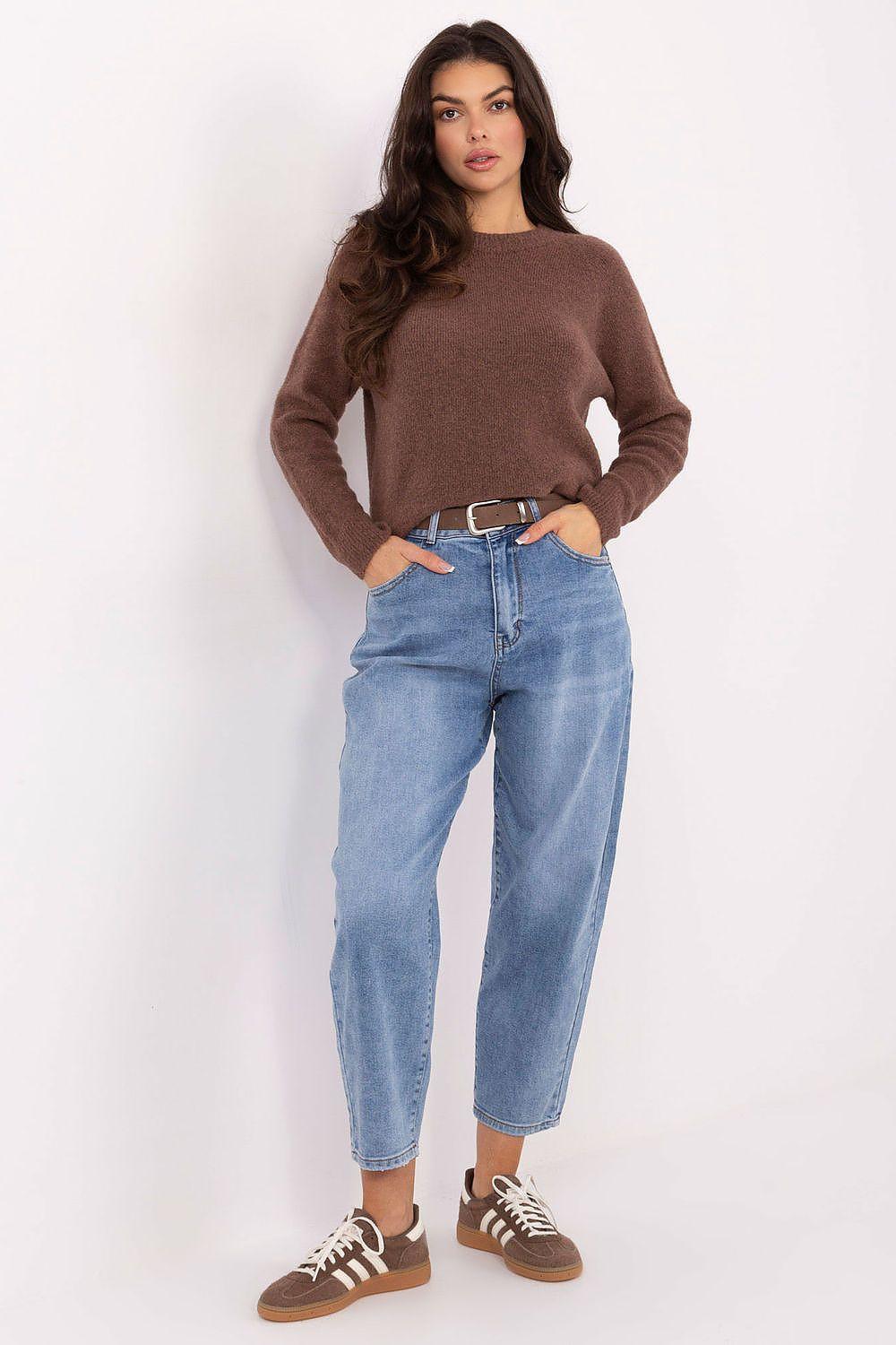 Blue high-waist carrot jeans with button fly, belt loops, and cuffed hem