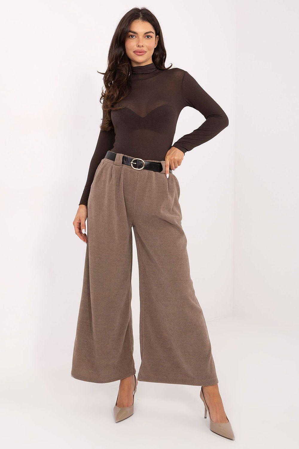 Beige high-waist wide-leg corduroy trousers with belt loops and silver buckle