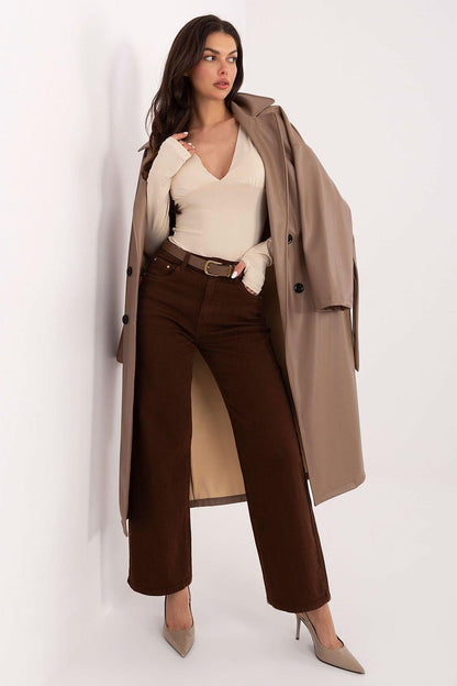Cream long-sleeve V-neck blouse with fitted waist and long sleeves