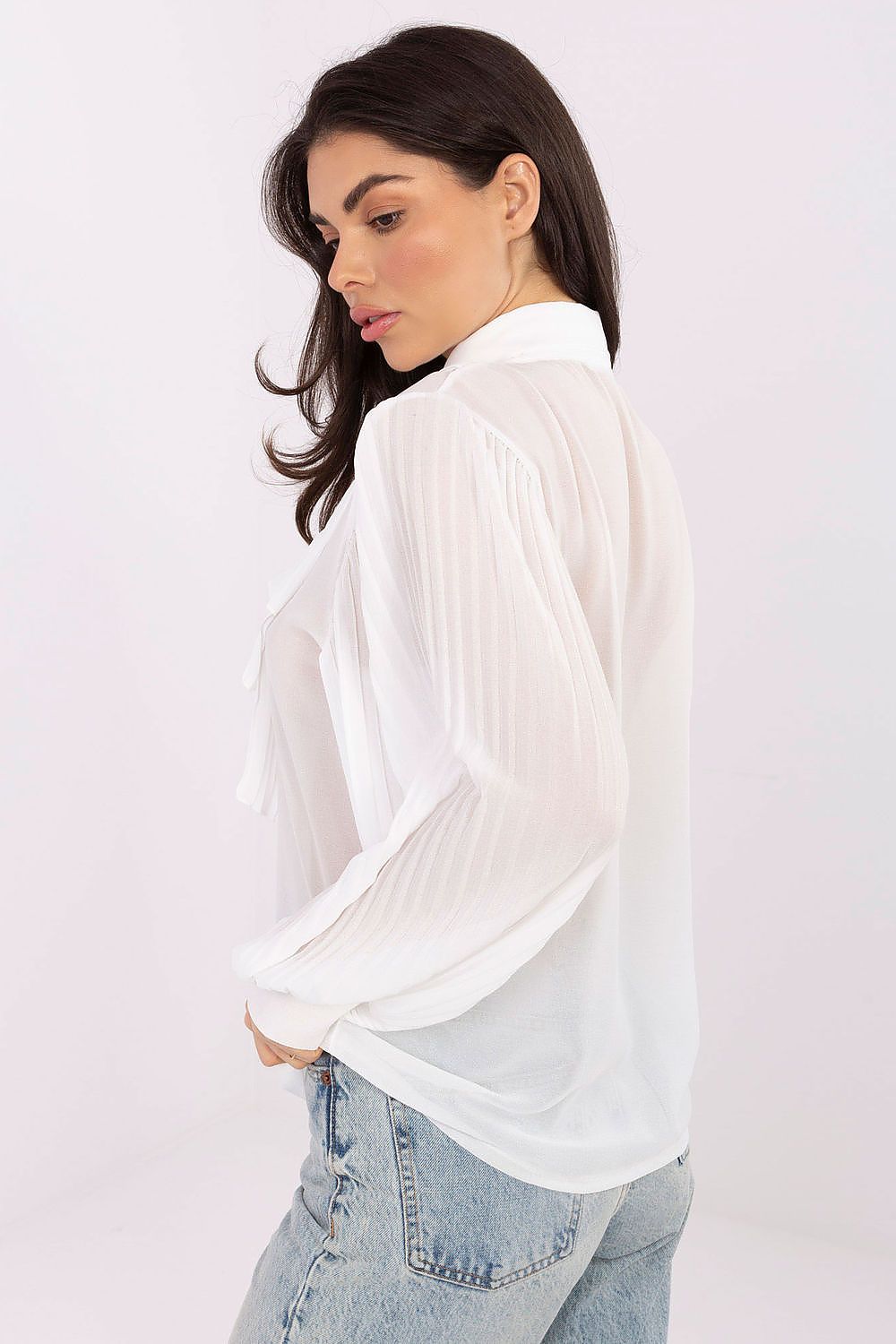 White pleated long-sleeve shirt with jabot front, shown from the back