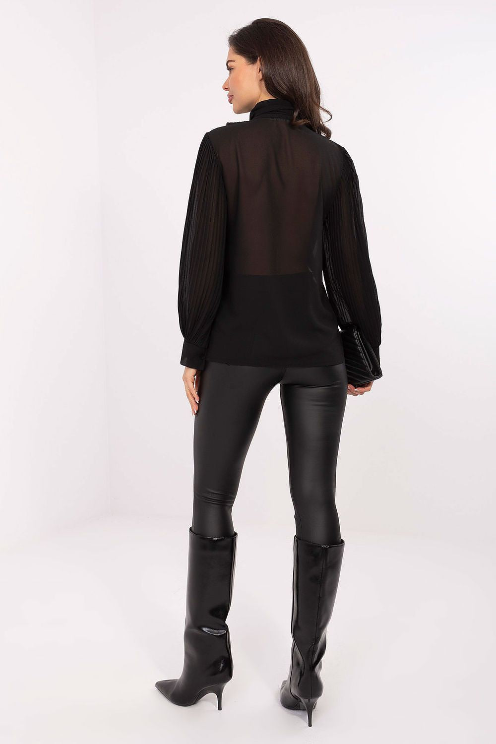 Black pleated long-sleeve shirt, back view with sheer yoke and button cuffs